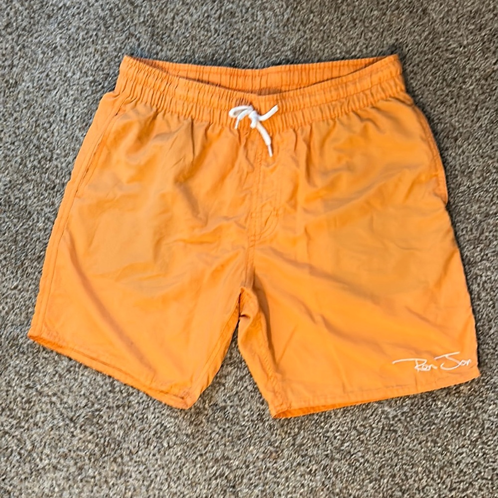 Men’s orange Ron Jon swim trunks, Size Medium